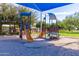 Colorful playground featuring pirate ship structures and slides, providing a fun and safe environment for outdoor play at 3875 E Claxton Ave, Gilbert, AZ 85297