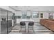 Well-designed kitchen flows into living area, featuring modern appliances and sleek flooring at 4606 W Park Ave, Chandler, AZ 85226