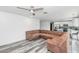 Cozy living space featuring sleek flooring, abundant natural light, and seamless transition to kitchen at 4606 W Park Ave, Chandler, AZ 85226