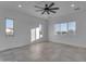 Bright, open bedroom featuring tile floors and abundant natural light from multiple windows at 475 W Saddle Mountain Rd, Phoenix, AZ 85086