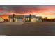 Striking front view of modern home with stylish garage doors, manicured landscaping, and a welcoming entrance at 475 W Saddle Mountain Rd, Phoenix, AZ 85086
