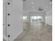 Expansive open-concept living space with modern tile flooring, recessed lighting, and abundant natural light at 475 W Saddle Mountain Rd, Phoenix, AZ 85086