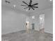 Bright, spacious main bedroom with an elegant ceiling fan and tile floors at 475 W Saddle Mountain Rd, Phoenix, AZ 85086