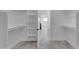 Spacious walk-in closet with built-in shelving and convenient access to other areas at 475 W Saddle Mountain Rd, Phoenix, AZ 85086