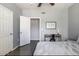 Calm and inviting bedroom with neutral tones, minimalist decor, and a convenient study area at 5345 E Van Buren St # 209, Phoenix, AZ 85008