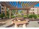 This picnic area features a stone table with seating, perfect for outdoor gatherings at 5345 E Van Buren St # 209, Phoenix, AZ 85008