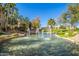 Stunning water feature surrounded by palm trees and well-maintained landscaping at 5345 E Van Buren St # 209, Phoenix, AZ 85008