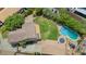 A lovely aerial view featuring the backyard, pool, sports court, and trampoline at 5787 W Barbara Ave, Glendale, AZ 85302