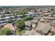 Aerial view of a home with pool and detached garage at 5787 W Barbara Ave, Glendale, AZ 85302