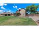A spacious backyard with a grassy lawn perfect for activities and entertaining at 5787 W Barbara Ave, Glendale, AZ 85302
