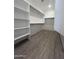 View of a large walk-in closet with shelving at 5937 N Nigal Rd, Casa Grande, AZ 85194