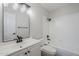 Modern bathroom features a vanity with black hardware and shower/tub combo at 6214 W Sunnyside Dr, Glendale, AZ 85304