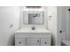 Bathroom featuring a modern vanity, vanity mirror and lighting at 6214 W Sunnyside Dr, Glendale, AZ 85304