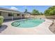 Inviting backyard pool with a diving board and covered patio, perfect for relaxation and entertaining at 6214 W Sunnyside Dr, Glendale, AZ 85304