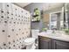 Comfortable bathroom featuring a vanity with sink, a toilet, and a shower-tub combination at 6638 W Nez Perce St, Phoenix, AZ 85043