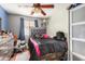 Stylish bedroom featuring a ceiling fan, a comfortable bed, and a dresser at 6638 W Nez Perce St, Phoenix, AZ 85043