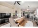 Open concept dining area with seating for six and access to the kitchen at 6638 W Nez Perce St, Phoenix, AZ 85043