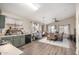 Open kitchen with ample counter space and a view of the dining area at 6638 W Nez Perce St, Phoenix, AZ 85043