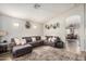 Cozy living room with ample seating and plenty of natural light at 6638 W Nez Perce St, Phoenix, AZ 85043