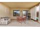Inviting covered patio with outdoor seating, perfect for relaxation and entertaining at 6638 W Nez Perce St, Phoenix, AZ 85043