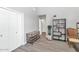 Bright bedroom with ample closet space and modern wood floors for a clean and organized space at 6915 E Lakeview Ave, Mesa, AZ 85209