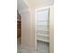 Walk-in pantry with multiple shelves at 6928 W Oraibi Dr, Glendale, AZ 85308