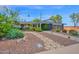 Desert landscaping and stone details highlight this home's curb appeal at 8730 E Montecito Ave, Scottsdale, AZ 85251
