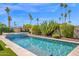 Stunning pool area with mature landscaping and desert views in this backyard paradise at 8730 E Montecito Ave, Scottsdale, AZ 85251