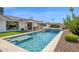 Sparkling pool with integrated spa, outdoor grill, and covered patio offers a relaxing backyard oasis at 8730 E Montecito Ave, Scottsdale, AZ 85251