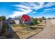 Large backyard with a vibrant playground and ample space for outdoor fun at 8828 E Des Moines St, Mesa, AZ 85207
