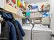 Well-organized laundry room and ample storage at 8828 E Des Moines St, Mesa, AZ 85207