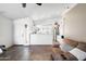 Bright, open living space with tile flooring and a view of the kitchen at 8828 E Des Moines St, Mesa, AZ 85207