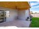 Covered patio with ceiling fan and sliding glass door, great for outdoor living at 8828 E Des Moines St, Mesa, AZ 85207