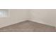 Bedroom features neutral carpet, natural light and white trim at 908 W Mohawk Ln, Phoenix, AZ 85027