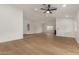 Open concept living area with wood flooring and view of adjacent rooms at 908 W Mohawk Ln, Phoenix, AZ 85027