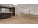 Spacious, open-concept living room features vaulted ceilings and wood flooring at 908 W Mohawk Ln, Phoenix, AZ 85027