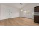 Open floor plan with recessed lights, laminate floors, and neutral paint at 908 W Mohawk Ln, Phoenix, AZ 85027
