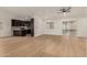 Spacious living room with wood floors and recessed lighting at 908 W Mohawk Ln, Phoenix, AZ 85027