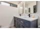 Elegant bathroom featuring dual sinks, quartz countertops, and modern fixtures at 9265 E Kalil Dr, Scottsdale, AZ 85260