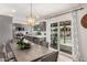 Dining room area with access to the backyard pool at 9265 E Kalil Dr, Scottsdale, AZ 85260