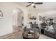 Spacious living room featuring a wood-look floor and open concept design at 9265 E Kalil Dr, Scottsdale, AZ 85260