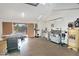 Spacious garage featuring a variety of power woodworking equipment, perfect for hobbyists and DIY enthusiasts at 9476 E Laurel Ln, Scottsdale, AZ 85260