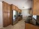 Updated kitchen with stainless steel appliances, tile backsplash, and plenty of cabinet space at 9476 E Laurel Ln, Scottsdale, AZ 85260