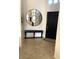 Welcoming entryway featuring a decorative mirror and console table at 10175 E Cochise Dr, Scottsdale, AZ 85258