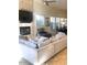 Bright living room with a fireplace and built in entertainment center at 10175 E Cochise Dr, Scottsdale, AZ 85258