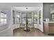 Bright breakfast nook featuring a modern pendant light and stylish round table perfect for casual dining at 1441 W Sea Haze Dr, Gilbert, AZ 85233