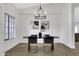 This dining room features modern lighting and neutral decor at 1441 W Sea Haze Dr, Gilbert, AZ 85233