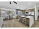 Spacious kitchen with updated appliances, a large island, and an adjacent breakfast nook at 1441 W Sea Haze Dr, Gilbert, AZ 85233