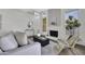 Spacious living room featuring a fireplace, accent furniture, and stylish decor at 1441 W Sea Haze Dr, Gilbert, AZ 85233