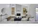 Bright living room with a fireplace, stylish decor, and outdoor views at 1441 W Sea Haze Dr, Gilbert, AZ 85233